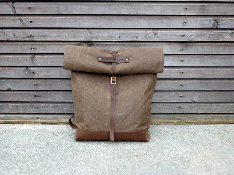 Waxed canvas rucksack/backpack with roll up top and waxed leather shoulderstrap,handle and leather bottem COLLECTION UNISEX
