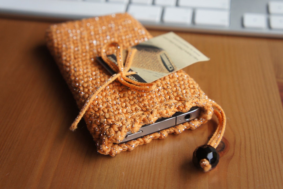 Crochet iPhone or iPod case in orange tone with sparklings
