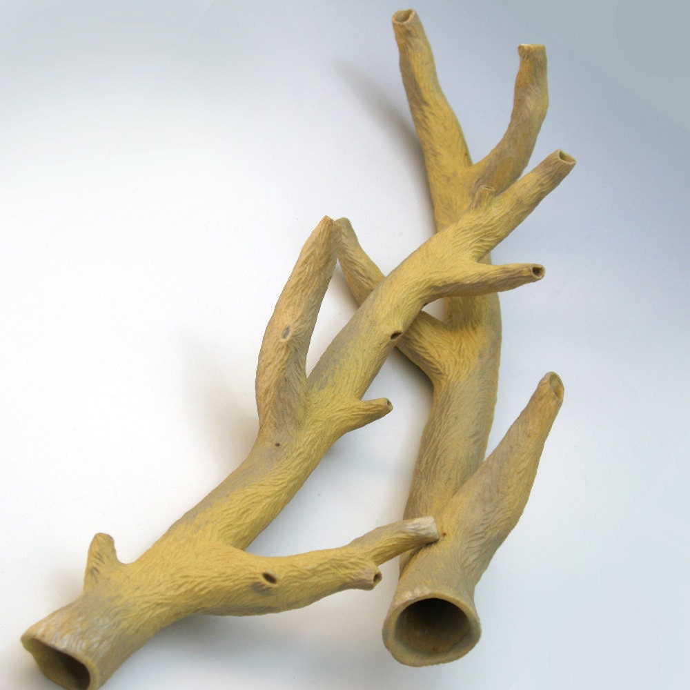 Carved porcelain branch in tan, yellow & grey, faux bois