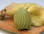 Green carved porcelain pod