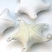 Pale yellow carved porcelain sea star