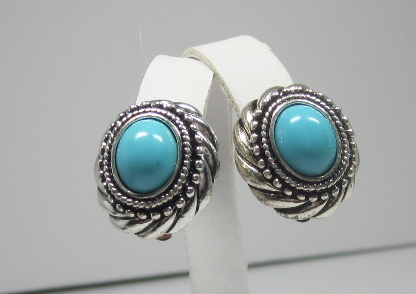 Vintage Faux Turquios and Silver Plated Textured Earrings Signed Avon