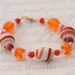 lampwork bead bracelet. orange & red, summer fashion