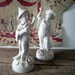 A Pair of Italian Glazed Porcelain Chinese Happy Dancing Buddhas
