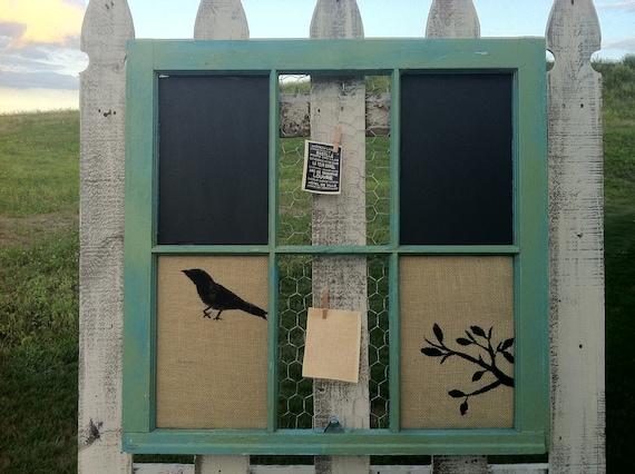 burlap covered corkboard, chalkboard, and chickenwire combo in vintage barnwood window