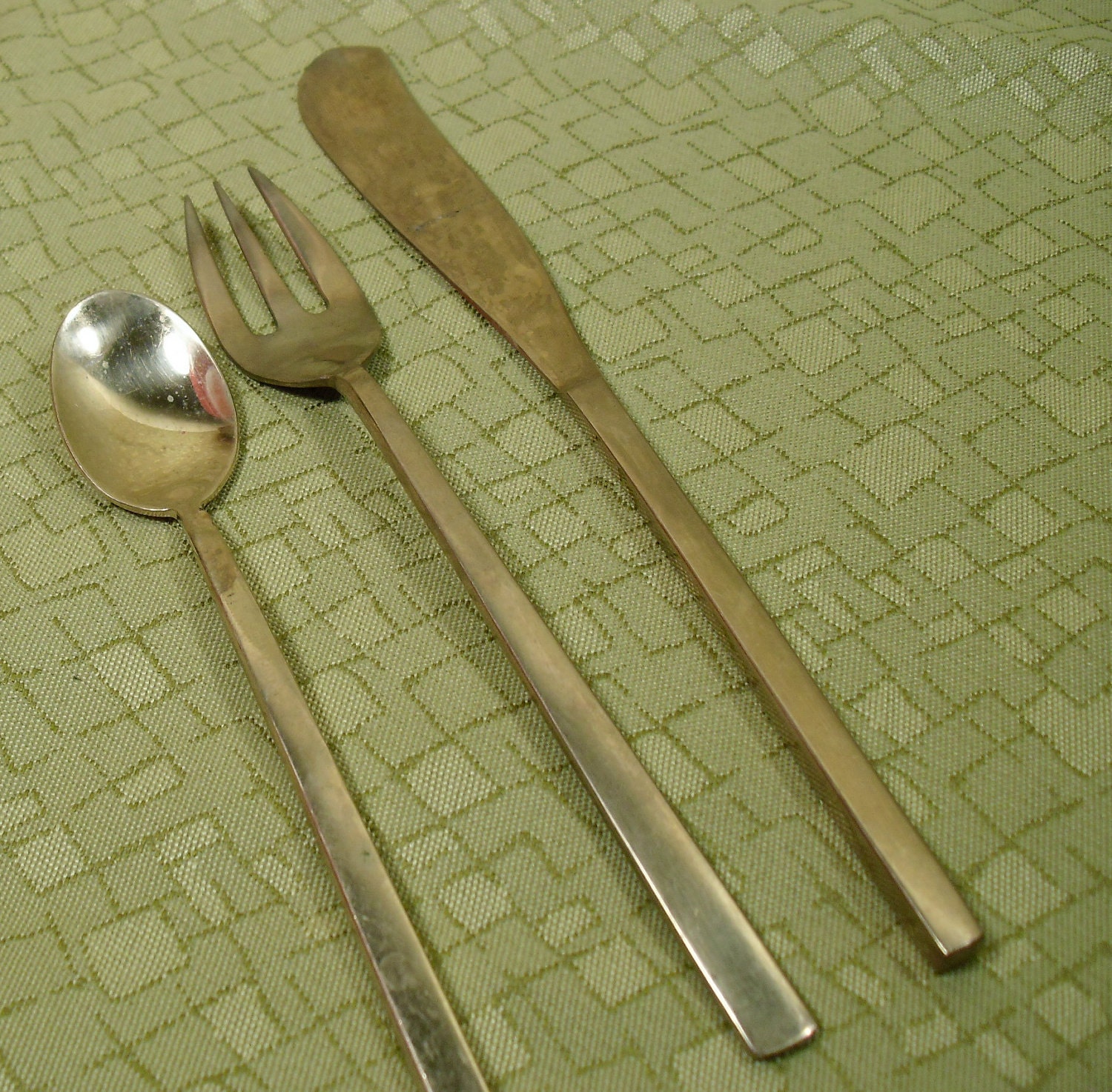 Gold Colored Flatware in Mid-Century Modern Shapes