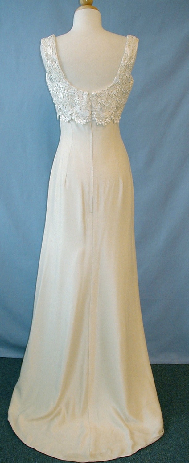Gorgeous empire wedding dress by Carmela Sutera