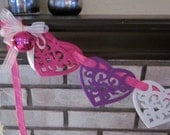 Pink, white and purple felt heart garland