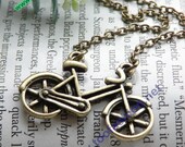 On sales now Pretty retro copper small bicycle bike pendant necklace vintage style