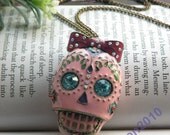 Pretty retro copper blue crystals eyes pink face skull with red bow necklace pendant jewelry vintage style