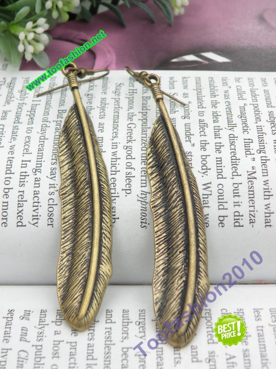 Pretty retro copper long bird feather pendant earrings vintage style