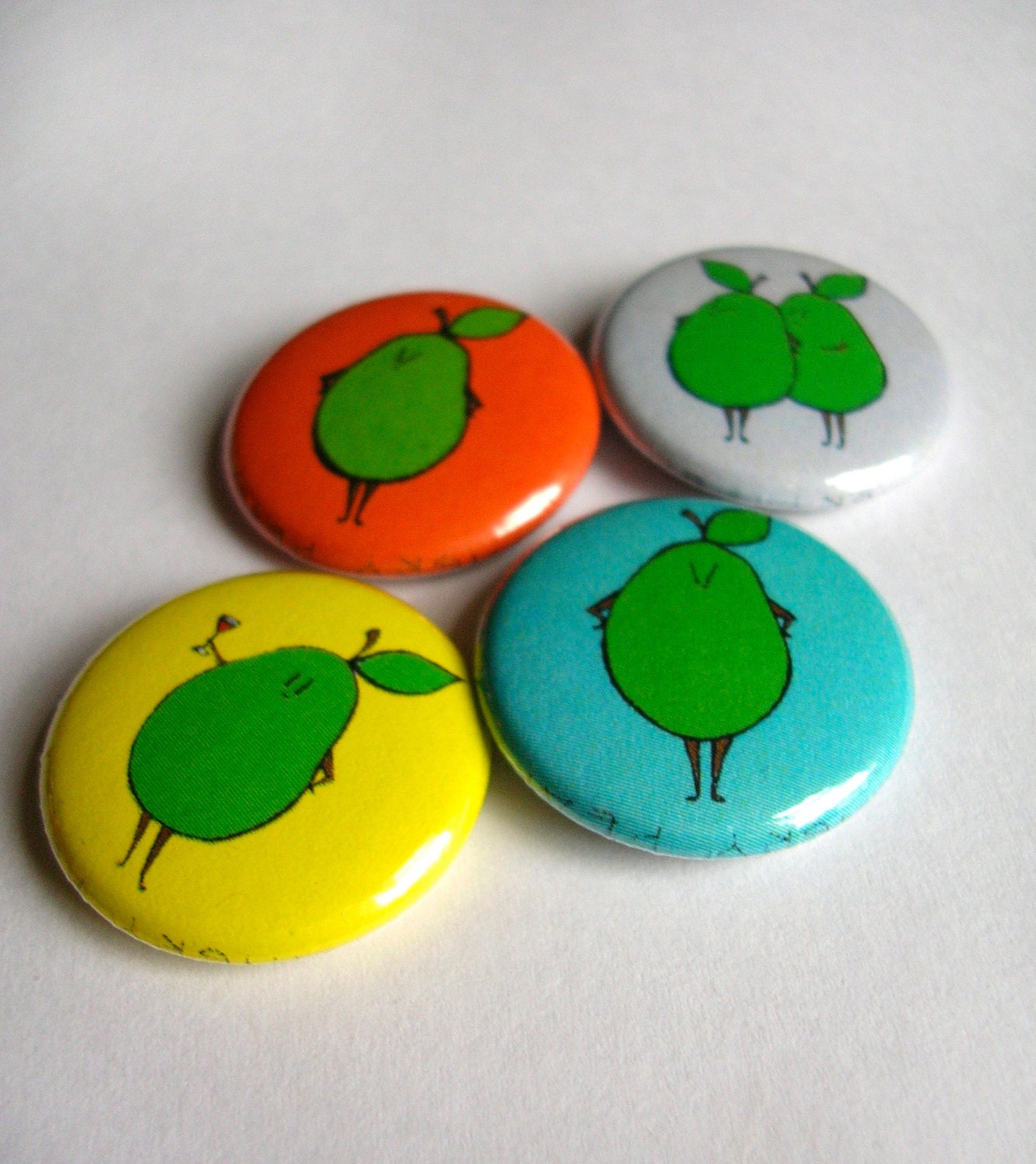 Funny, Angry Pear button set of 4 - color