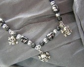 Geek Chic Black and Silver Pirate Skull and Crossbones Necklace - Handmade by Rewondered D225N-00126