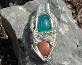 Sterling silver and gold wire wrapped pendant with aventuine Scarab, herkimer, and sparkly goldstone