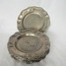 Set of Seven Pewter Plates