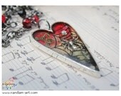 Infinite Mystery. Heart Pendant Silver Spider in a Web Encased in Resin