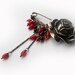 Desert rose pin brooch,kilt pin,with red corals,swarovski crystals,black jade beads