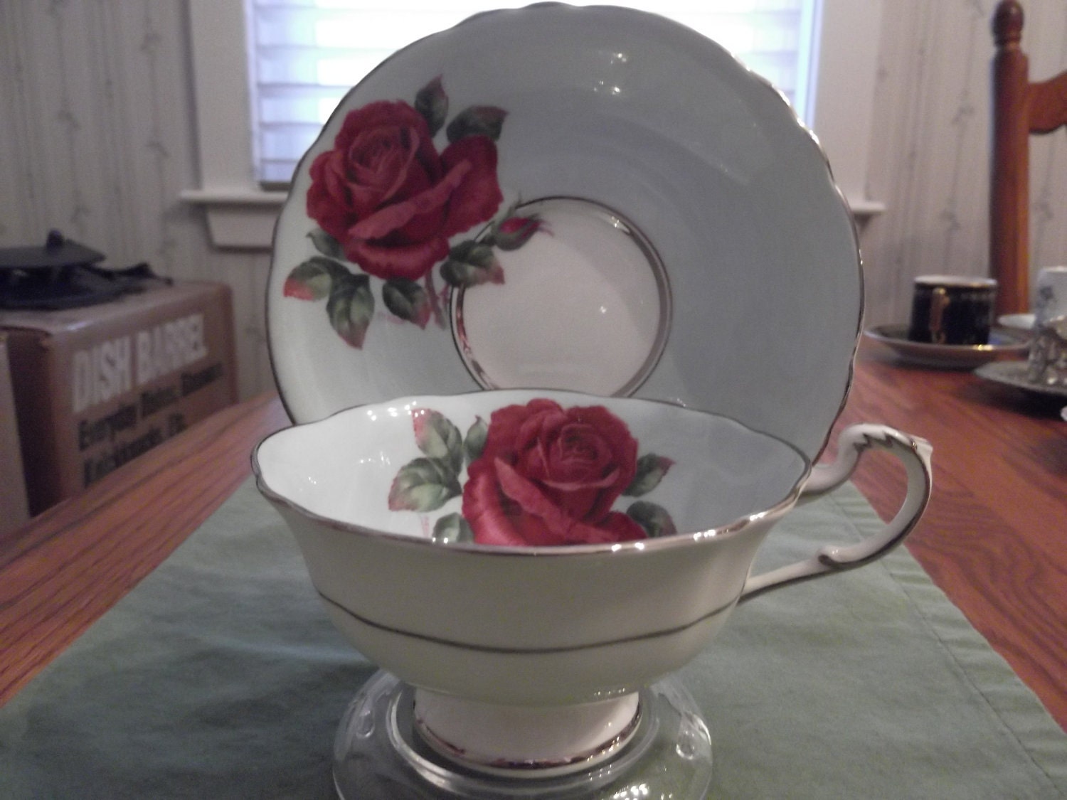 Paragon cup and saucer signed by R Johnson with platinum rims-circa 1950's  -DR