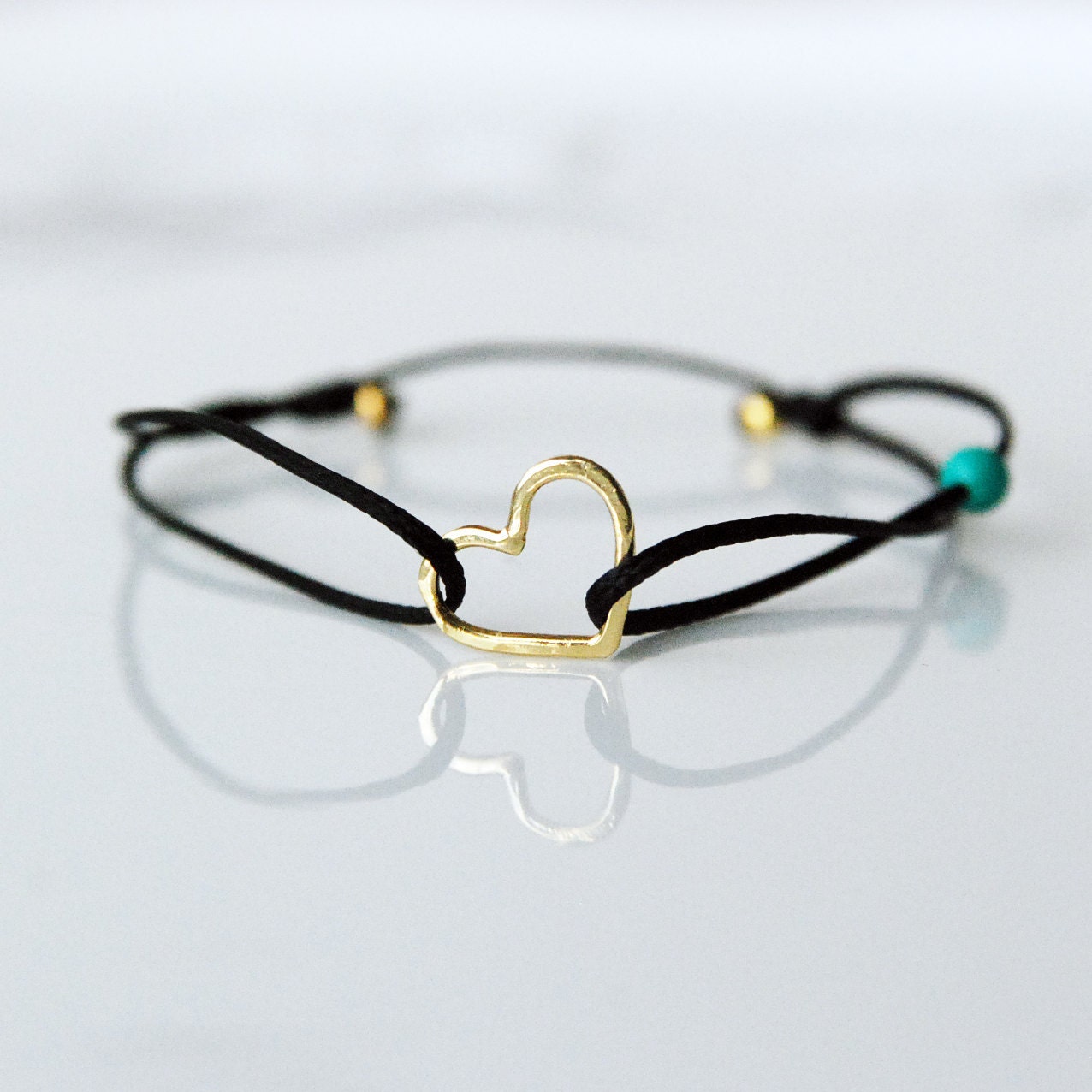 Gold heart bracelet  on black cord, cute girlfriend gift