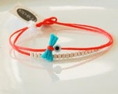 Sterling silver dainty bracelet with evil eye