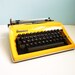 Vintage Contessa DeLuxe Yellow Typewriter Portable Manual Triumph Adler