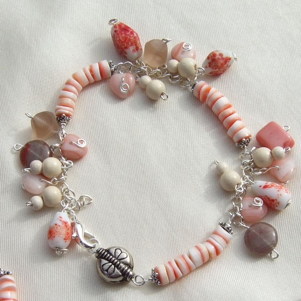 Coral Pink red lipped heishi shells Bracelet with  glass and wooden beads