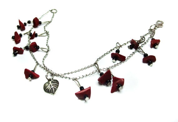 Red charm bracelet metal