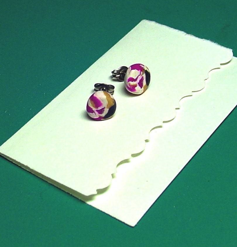 Titanium stud earrings. yellow and purple polymer clay earrings