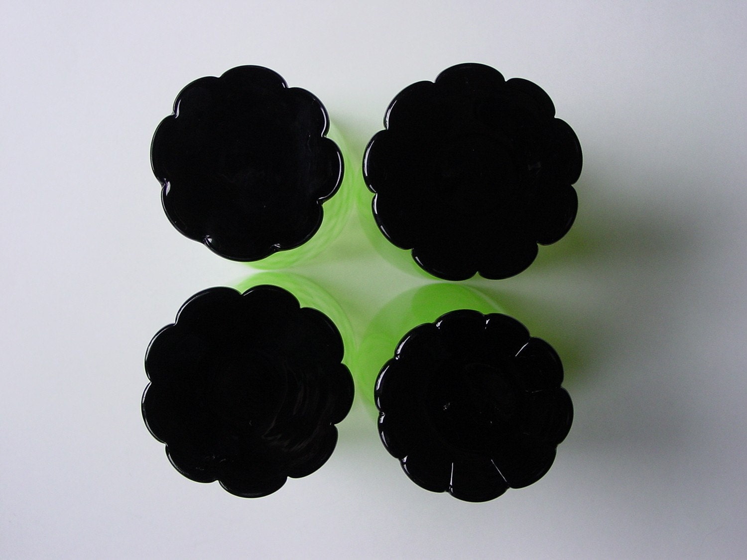 SALE...Grey Gardens Juice Glasses Absinthe Green Depression Glass Black Flower Feet Vaseline