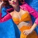 36-38 B Neon Orange PVC bra with adjustable plastic snap back and halter strap Artifice (photoshoot sample)