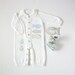 Knitted overalls in white full of fishes. Matching booties. 100% cotton. READY TO SHIP size Newborn.