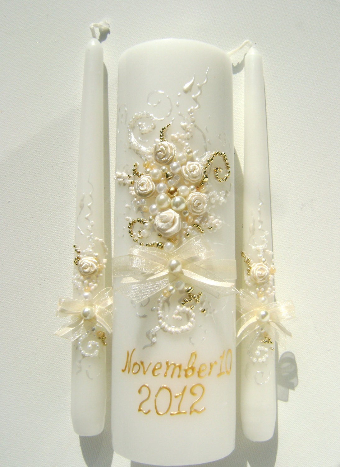 Wedding unity candle set - 3 white candles, hand decorated with ivory ribbon roses & bows and pearls, with a hint of gold and white