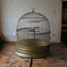 Vintage Round Brass Hendryx Birdcage with clear glass feeders