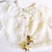 Hand knitted white baby vest with a beautiful plate of leaves, baby fashion, Christening /Baptism, READY TO SHIP