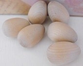 6 small wooden eggs