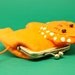 Little orange lion clutch purse