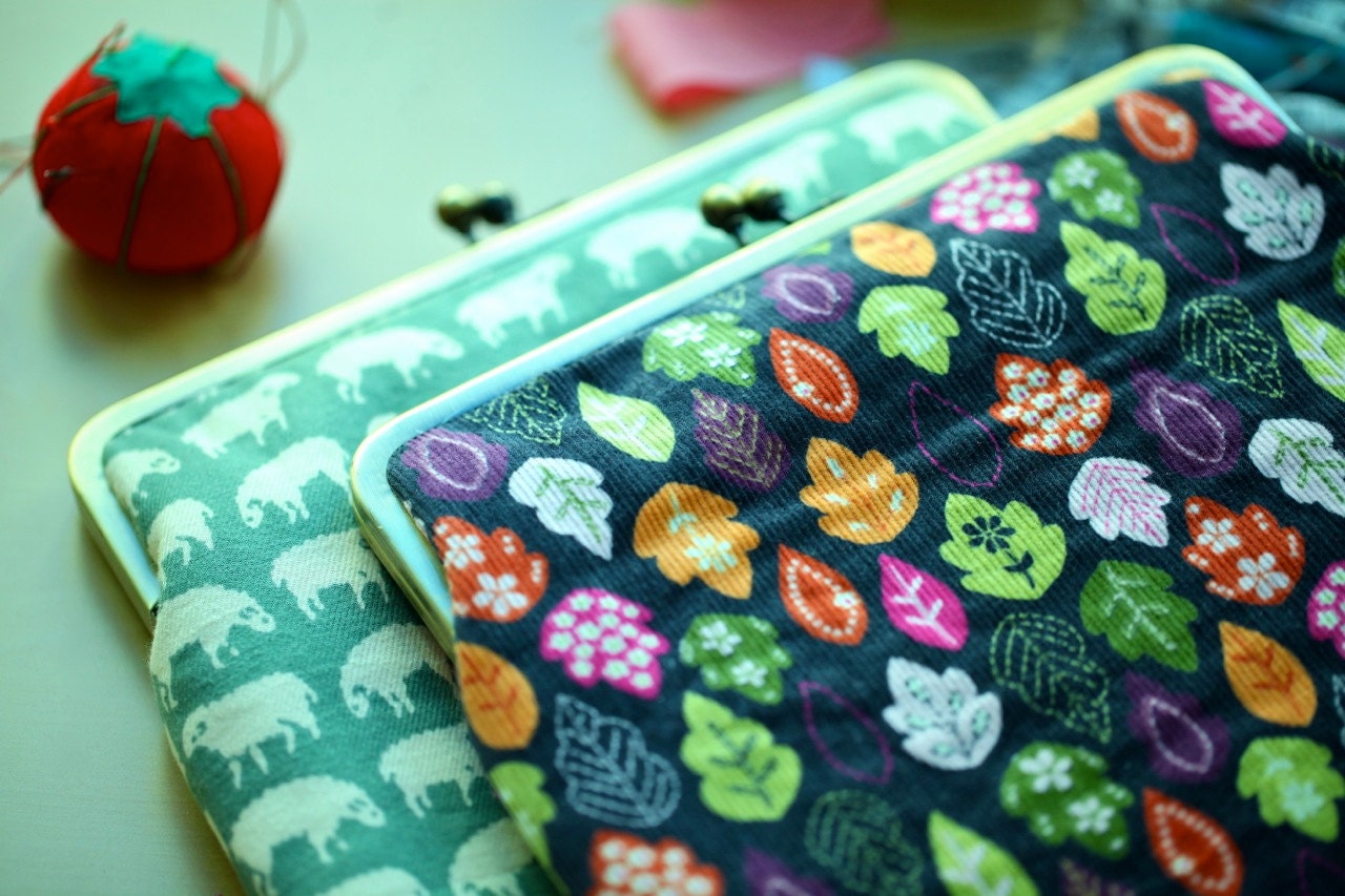 Sleepy sheep iPad sleeve with metal kisslock clutch