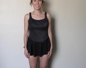 Black swimsuit with skirt. Medium.
