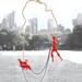 Red dog walker necklace - A walk in the park - Laser cut acrylic (plexiglass) jewelry