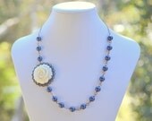 Vintage Style Ivory Rose and Navy Blue Pearl Asymmetrical Necklace in Antique Brass Jewelry Gift for Her.  Free Shipping.