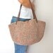 Hand knitted tricolor basket bag with genuine leather straps