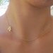 Sideways Gold Leaf Necklace. Off Center. Gold Branch.