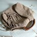 Fringed  Tassel Handbag with Boho Chic Style. Vintage chain detail.