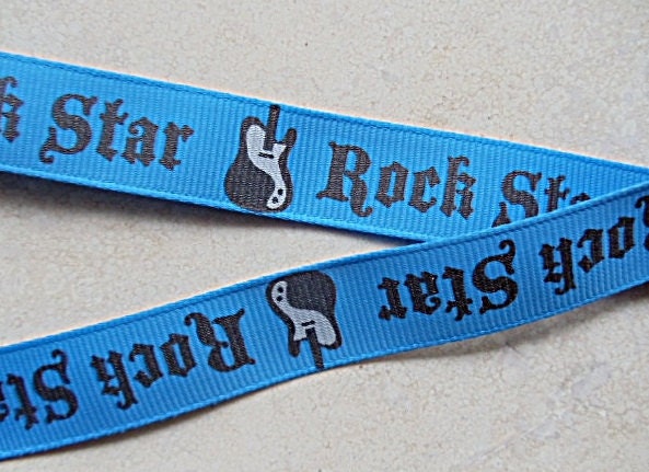 Rock Star on  turquoise blue 5/8" grosgrain April Klein ribbon