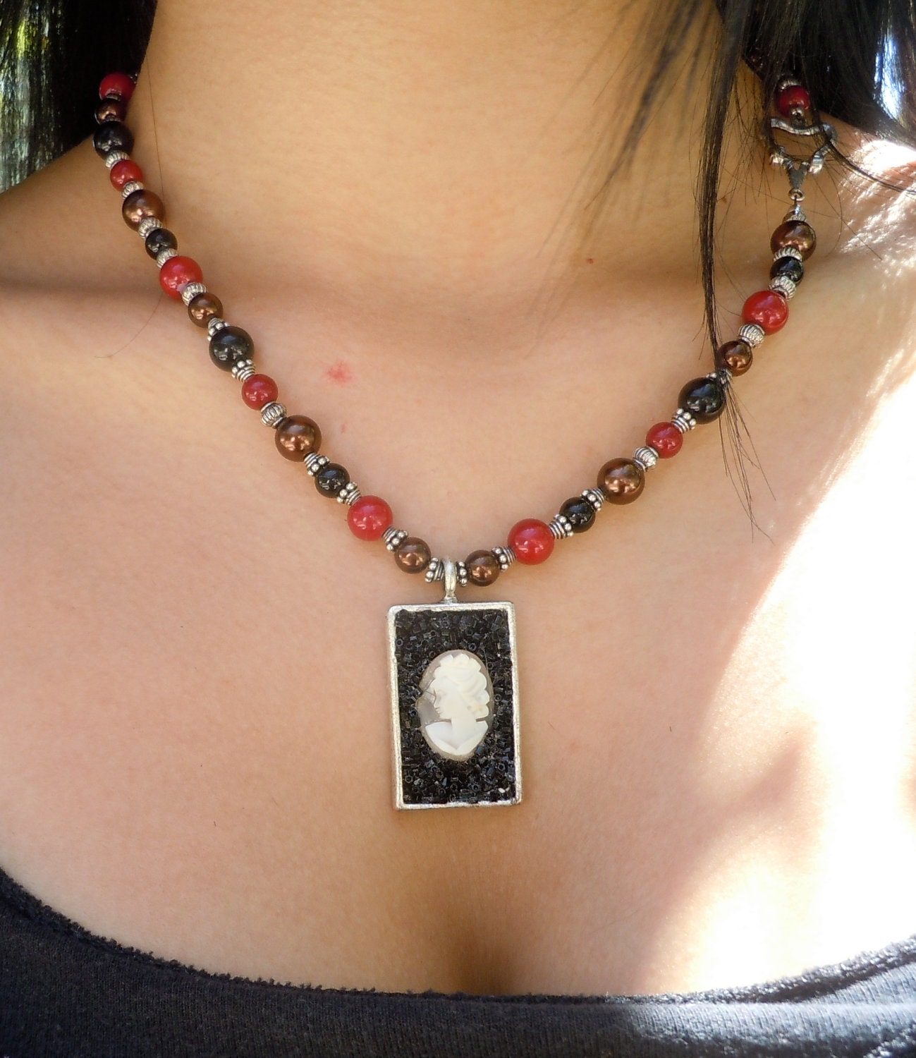 Cameo with a New Twist Nicely Framed in Silver and Surrounded with Shiny Black Miyuki Beads