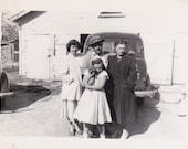 Vintage B&W Photo of Family in front of their house and car, while puppy "waves"