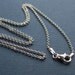 Holy Infant of Prague Antique Religious Sterling Medal on 18" sterling silver rolo chain