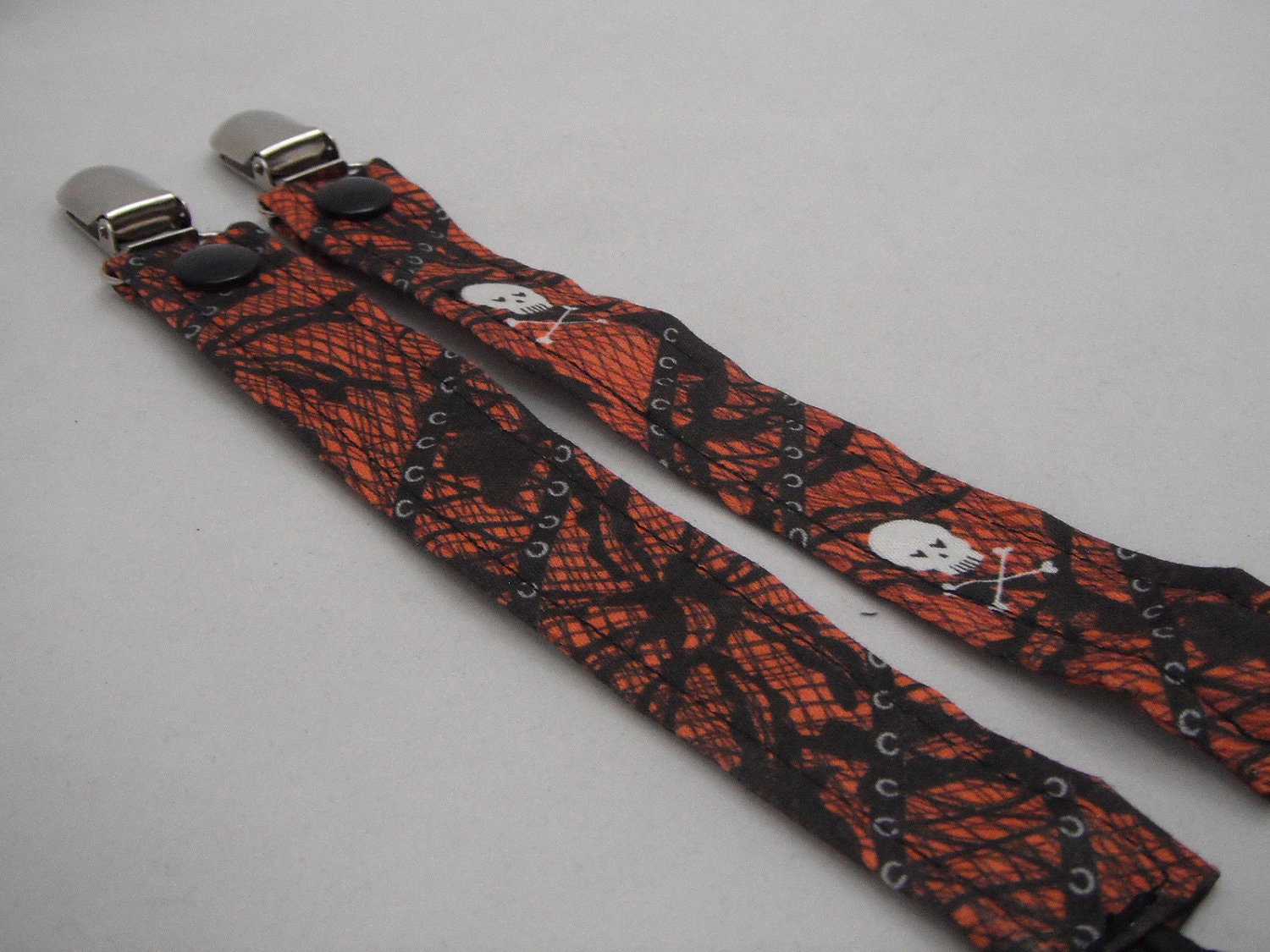 2 Pc Fabric Pacifier Clip Dark Orange Black Gothic Lace with White Skull and Crossbones Print - Universal Soothie Nuk Mam Gumdrop Avent