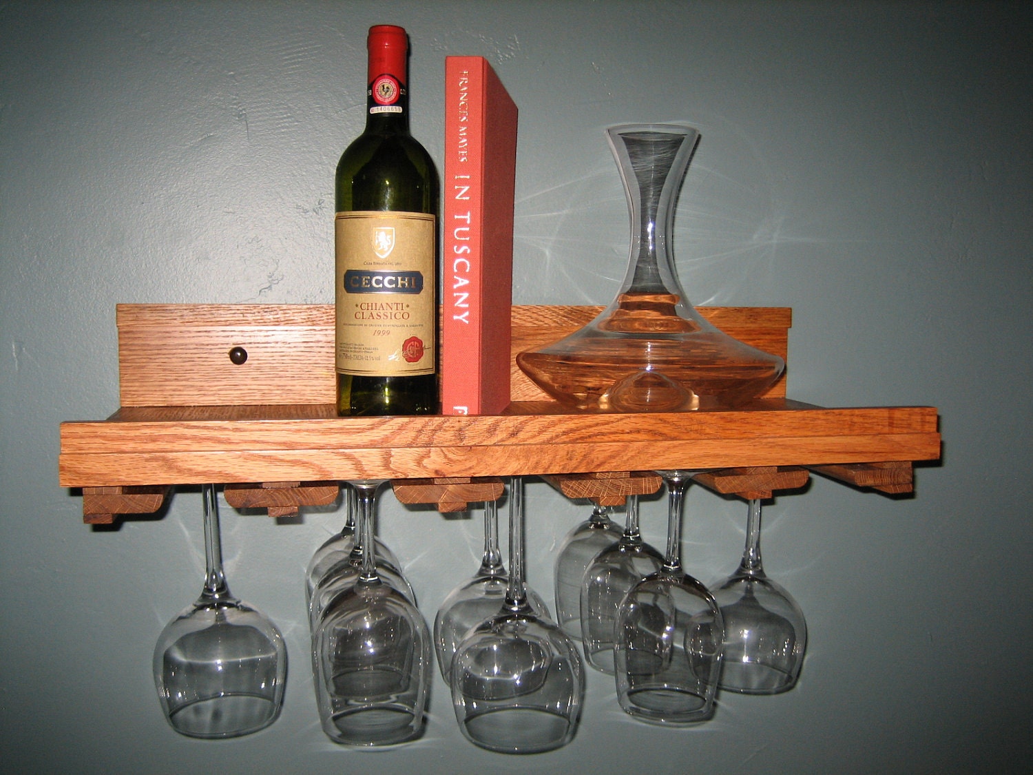 Custom made oak wine shelf with bottle and wine glass storage