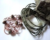 Twisted Copper Pendant with Moss Green Picasso Beads